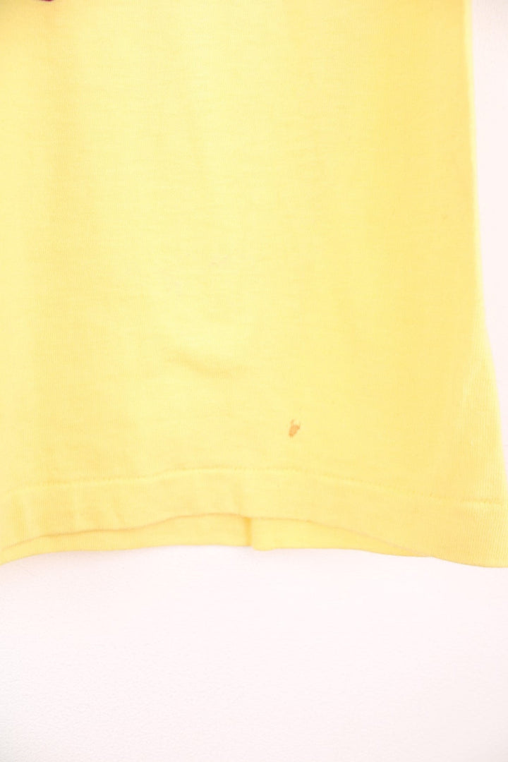 1983 Washington Redskins 'Hog Heaven' World Championships tee in yellow with pig and clouds design.