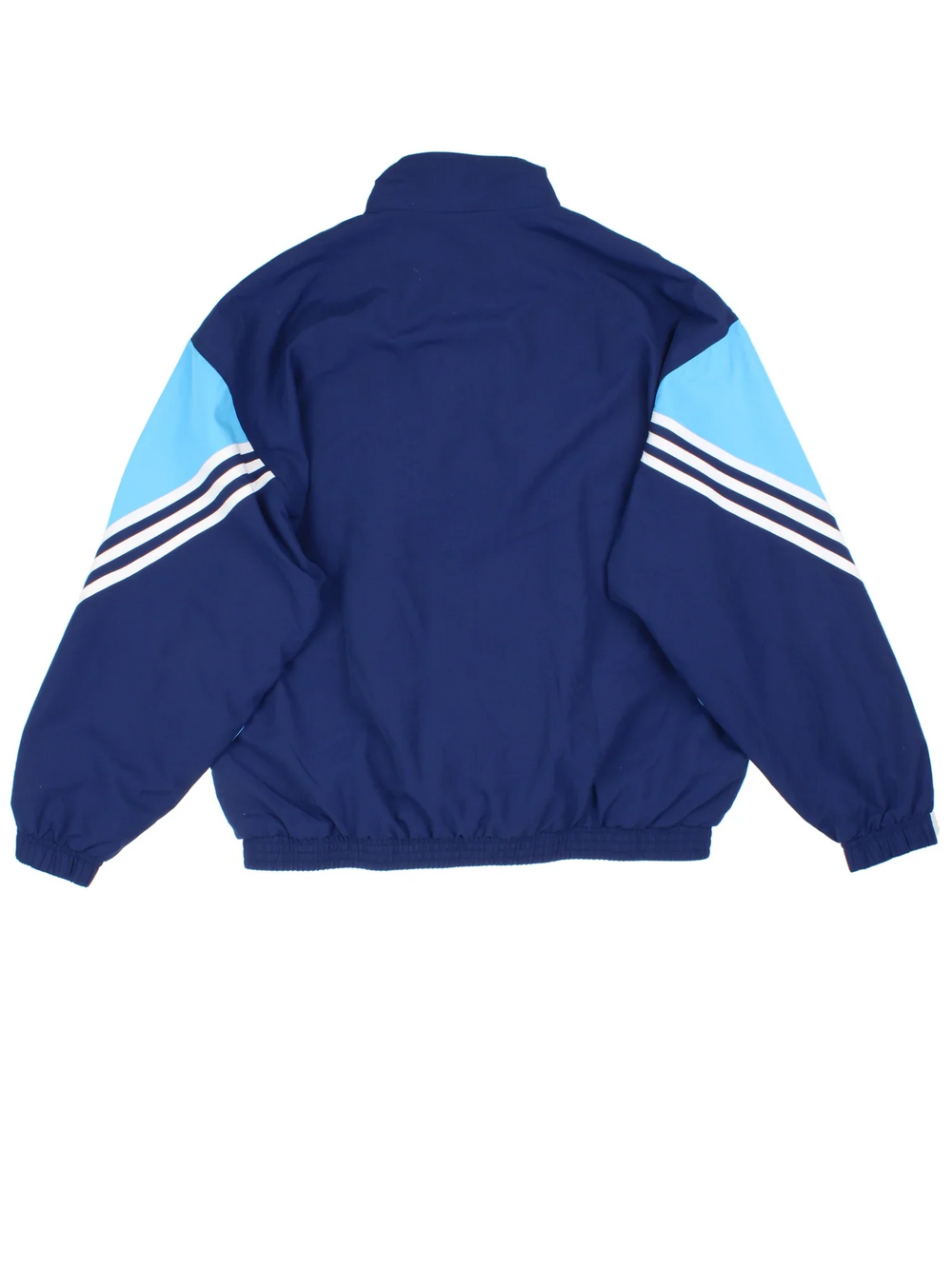 Vintage 90's Adidas Tracksuit Top in a blue colourway. Zip up fastening, side pockets, famous x3 stripe branding and has the logo embroidered on the front.