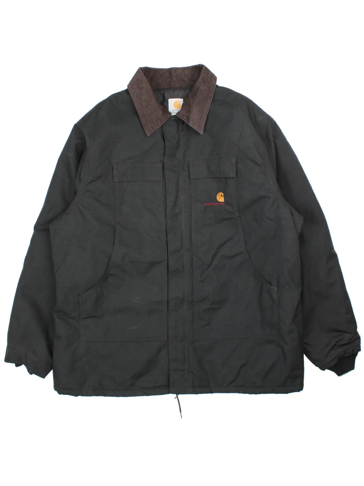 Vintage Carhartt Jacket in a black colourway. Zips up closure and has multiple pockets, insulated with a quilted lining, and has the logos embroidered on the front.