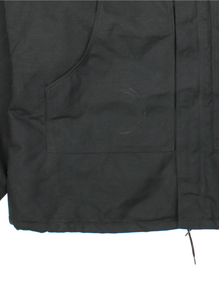 Vintage Carhartt Jacket in a black colourway. Zips up closure and has multiple pockets, insulated with a quilted lining, and has the logos embroidered on the front.