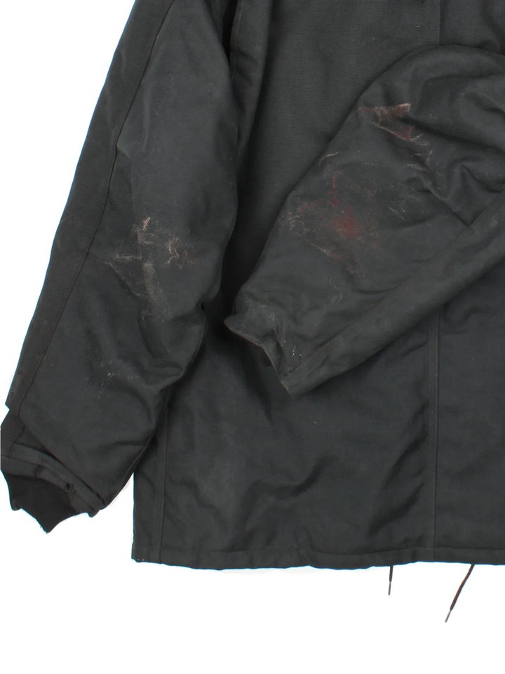Vintage Carhartt Jacket in a black colourway. Zips up closure and has multiple pockets, insulated with a quilted lining, and has the logos embroidered on the front.