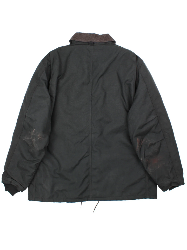 Vintage Carhartt Jacket in a black colourway. Zips up closure and has multiple pockets, insulated with a quilted lining, and has the logos embroidered on the front.