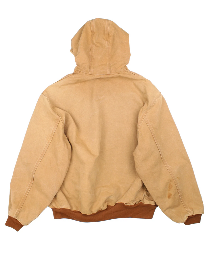 Vintage Carhartt Active Jacket in a tan colourway. Zip up closure and has side pockets, insulated lining, and has the logo embroidered on the front.
