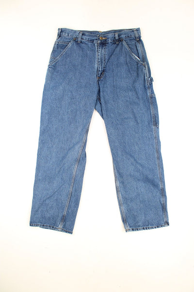 Carhartt Carpenter Jeans in a blue denim colourway, multiple pockets and has the logo embrodiered on the back. 