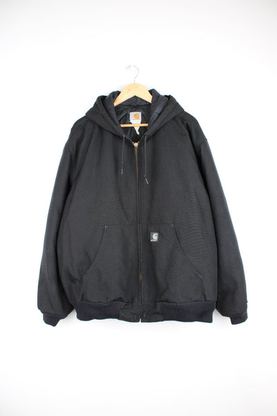 Carhartt Active Jacket in a black colourway, zip up with side pockets, hooded, quilted lining and has the logo embroidered on the front. 