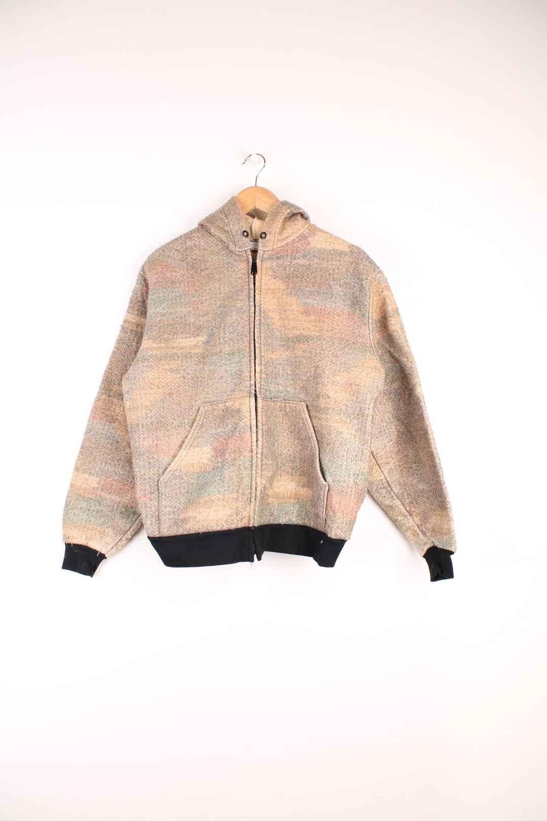 Vintage 90's Carhartt Southwest Blanket Hooded Sweatshirt in a aztec patterned colourway,  zip up with side pockets, and has the logo embroidered on the front.