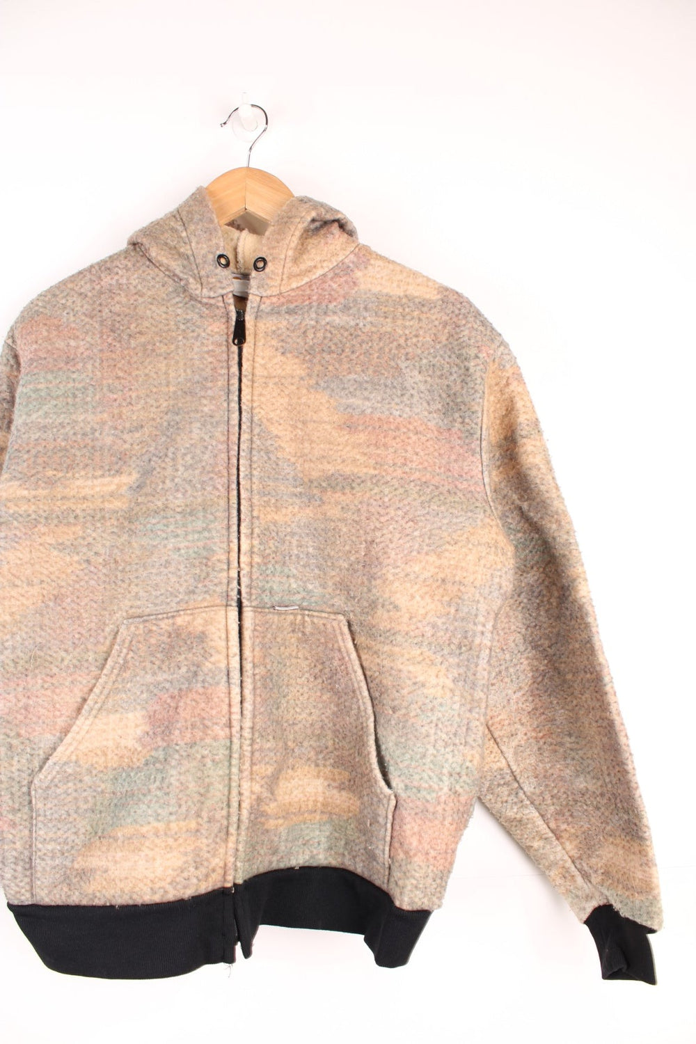 Vintage 90's Carhartt Southwest Blanket Hooded Sweatshirt in a aztec patterned colourway,  zip up with side pockets, and has the logo embroidered on the front.