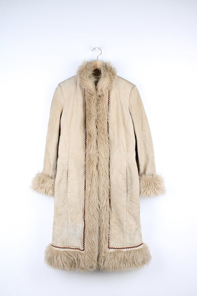 Y2K suede afghan coat in light tan with faux fur trim, hook and eye closure and embroidered details down the front and on the hem