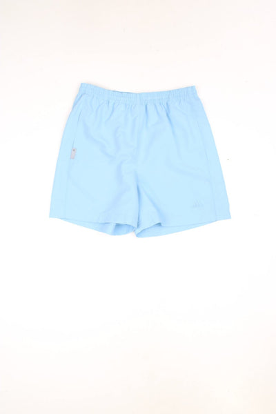Blue Adidas shorts with elasticated drawstring waist and embroidered logo. 