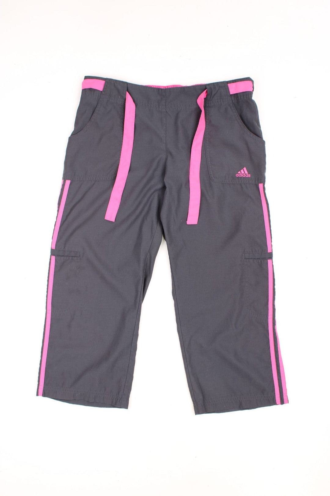 Grey and pink Adidas 3/4 length tracksuit bottoms with embroidered logo, signature three stripes down the leg and tie waist.