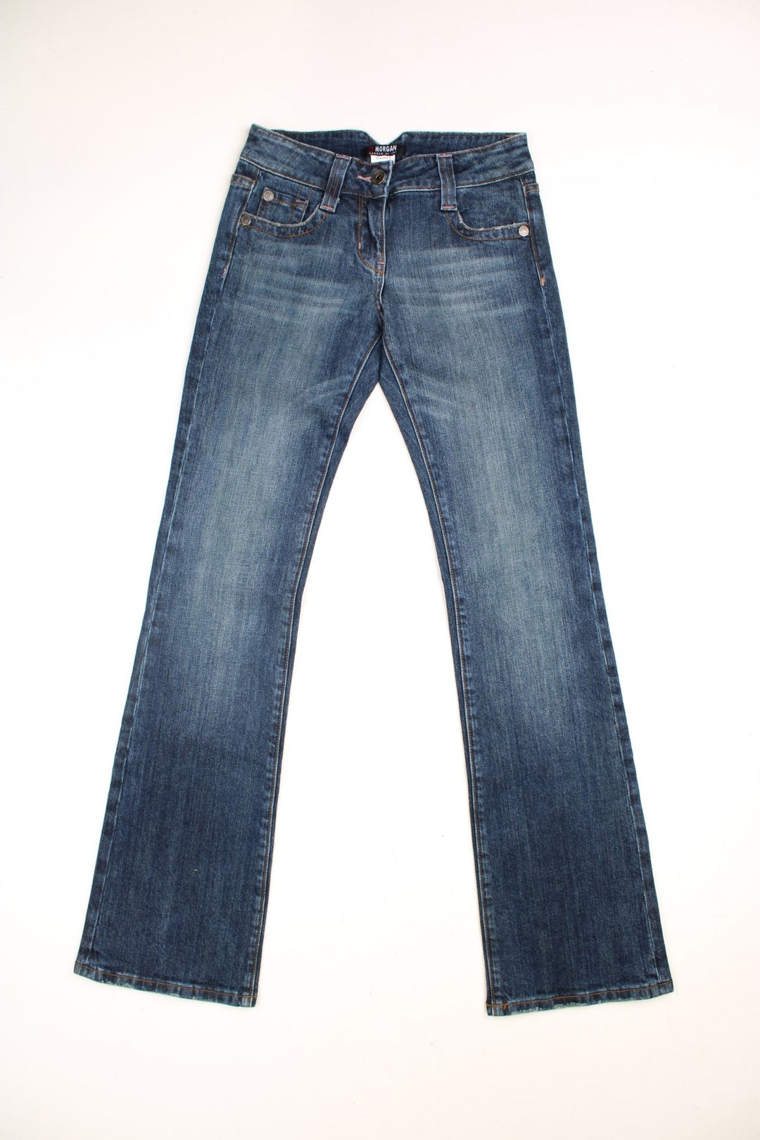 Y2K Morgan Jeans in a dark blue denim wash, low waisted with flares, has multiple pockets and 'M' embroidered patterns on the back.