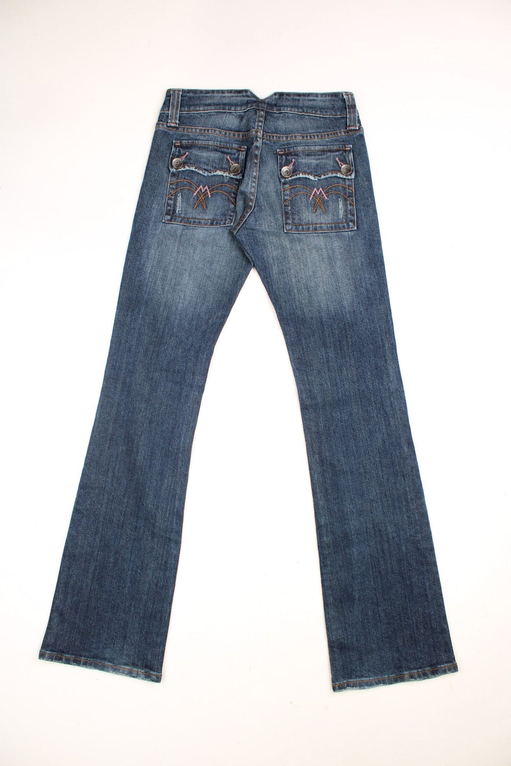 Y2K Morgan Jeans in a dark blue denim wash, low waisted with flares, has multiple pockets and 'M' embroidered patterns on the back.