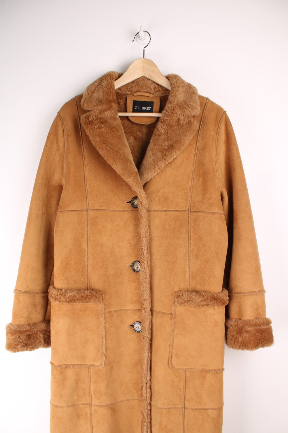 Gil Bret faux suede and fur maxi length afghan style coat with two patch pockets and button closure.