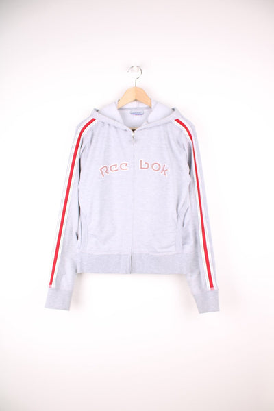 Grey and red Reebok zip through hoodie with embroidered spell out logo across the chest.