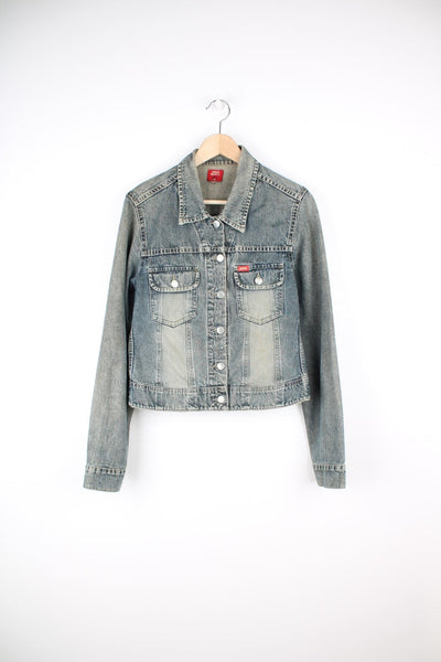 Miss Sixty Denim Jacket in a faded blue colourway, button up, has double chest pockets with the logo embroidered on the front. 