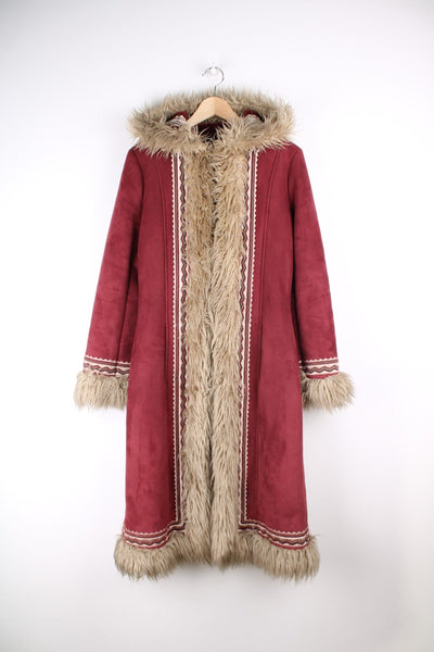 Vintage Topshop Afghan Coat in a red and tanned colourway, has faux fur lining going around the front, hood and cuffs, and also has an embroidered pattern going around these edges.