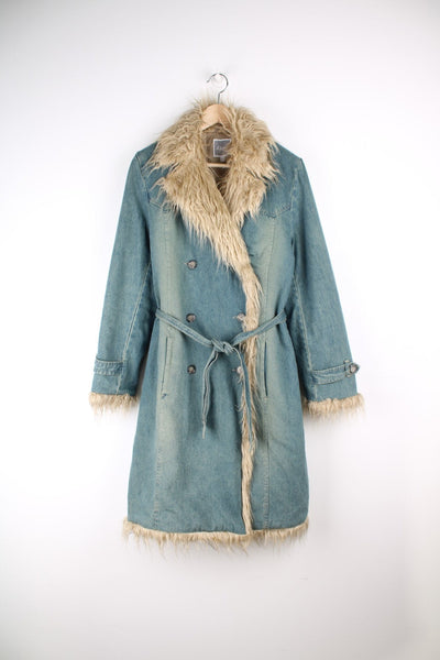 Vintage Etam Denim Afghan Coat in a light blue colourway with a tanned faux fur collar, button up and has a belt.
