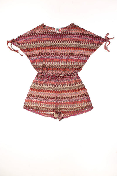 Vintage Crochet Zig Zag Patterned Playsuit in a red, orange and tanned colourway, has a crochet belt and has shorts in the lining. 
