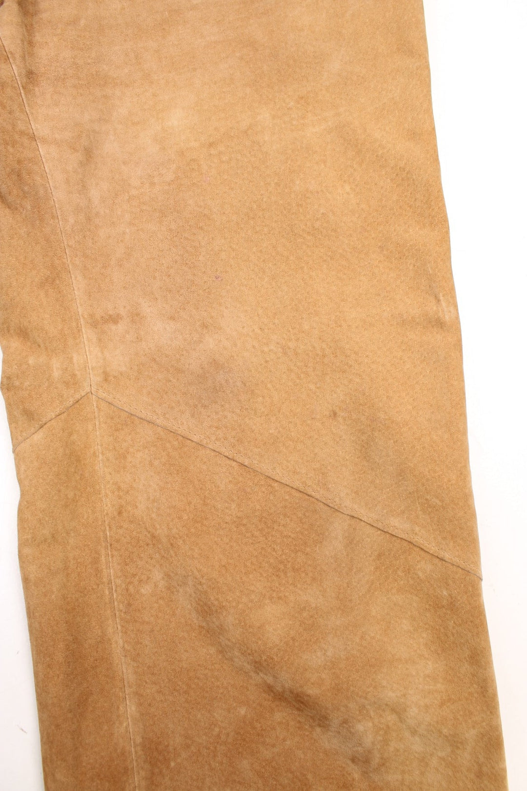 Western Leather Trousers in a  brown colourway with multiple pockets, and has cross stitching tassels down the side of the legs and round the back.