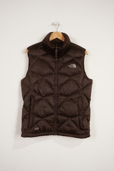 The North Face 550 brown double pocket satin gilet with embroidered logo on the front & back
