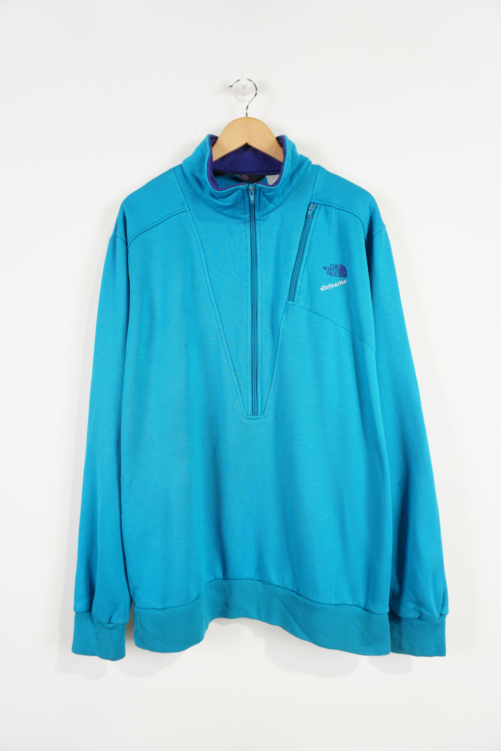 The North Face 1/4 zip high neck sweatshirt with embroidered spell-out logo on the front