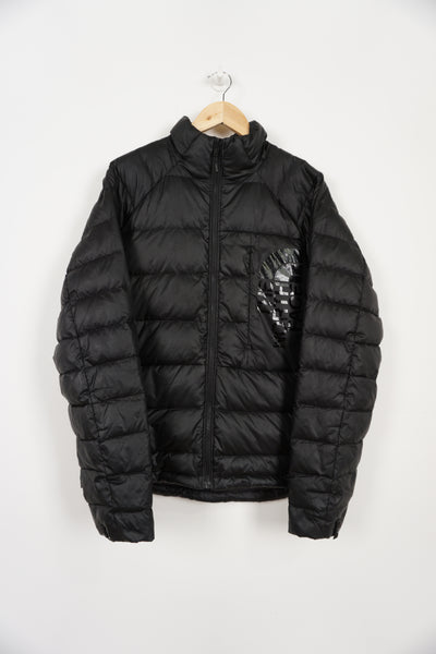All black The North Face shine logo puffer jacket with double pockets and drawstring hem