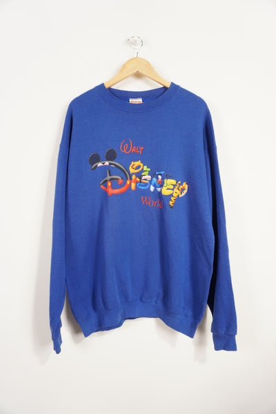 Vintage 90's blue crewneck sweatshirt with Walt Disney World spell-out graphic on the front