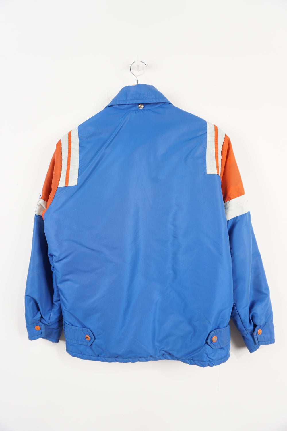 Vintage 1970s/80s Edmundston, Canada Hockey coach jacket with embroidered badges and quilted lining good condition - white parts discoloured due to colour bleeding from other parts of jacket, small hole near base of inside lining Size in Label: N/A - fits like a s/m