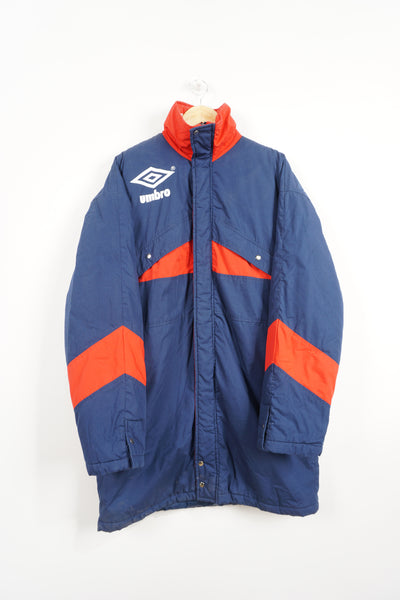 Vintage red & blue Umbro bench coat with printed logo on the front and back