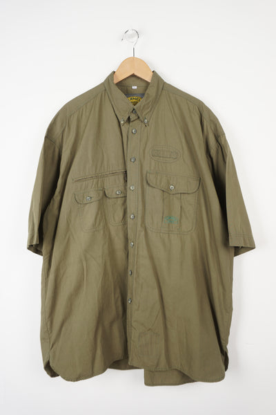 Camel Trophy Adventure Wear. Green short sleeved shirt with utility style pockets.