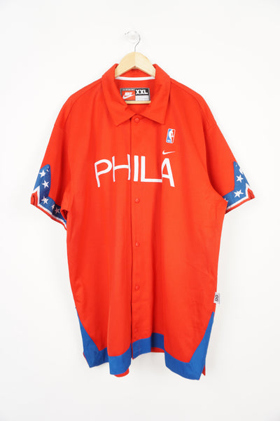 Vintage Nike 90's Philadelphia 76ers warm up jersey with embroidered spell-out on the chest and star details on the sleeve 