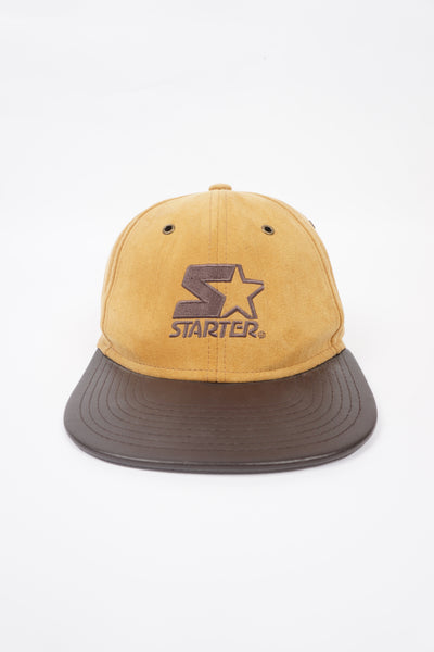 Two tone brown faux suede/leather Starter snapback cap with embroidered logo on the front 