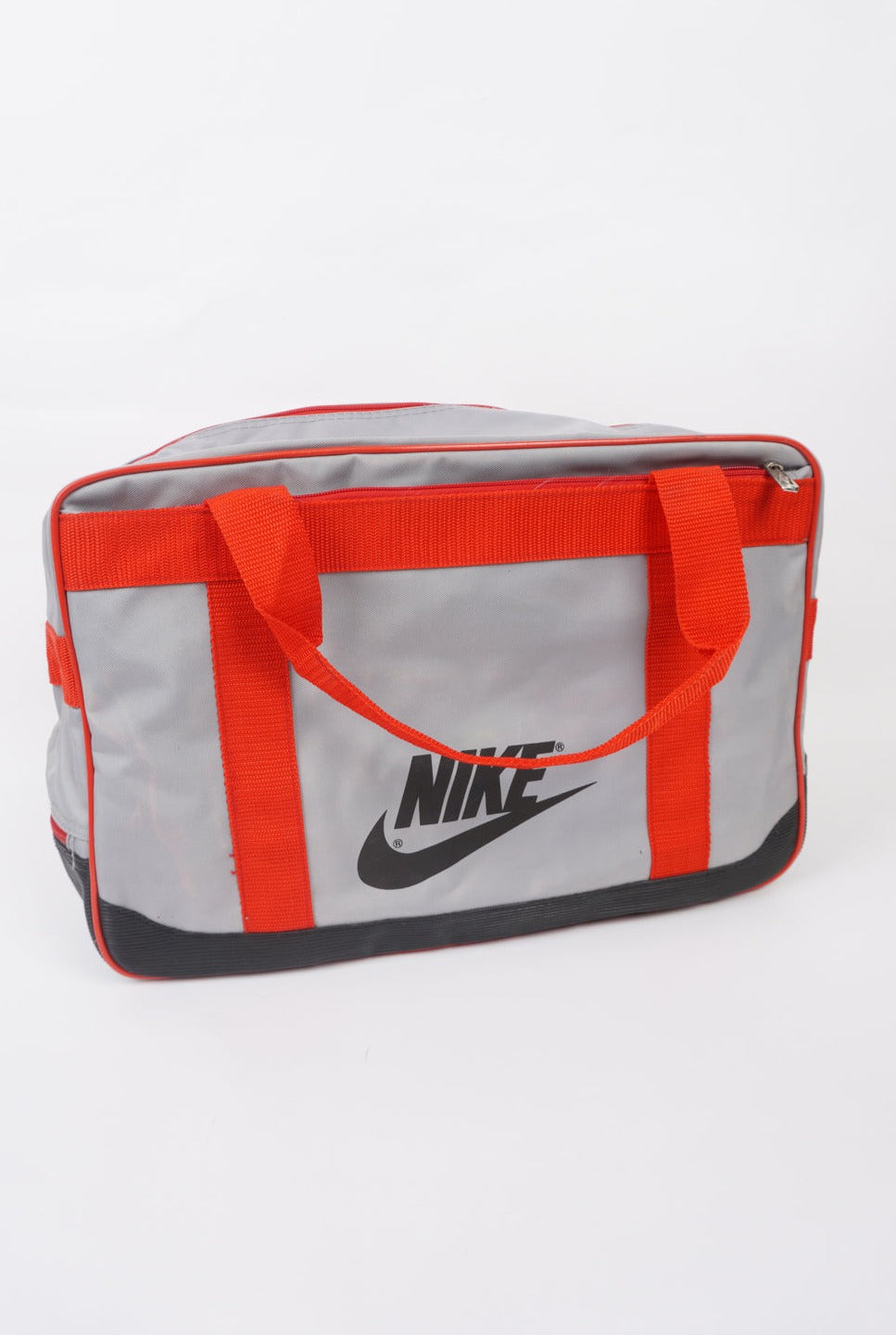 Vintage red and grey Nike spell-out duffle bag