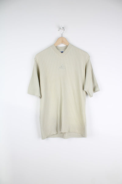 Vintage 90s Adidas v-neck ribbed T-Shirt with embroidered logo in beige.