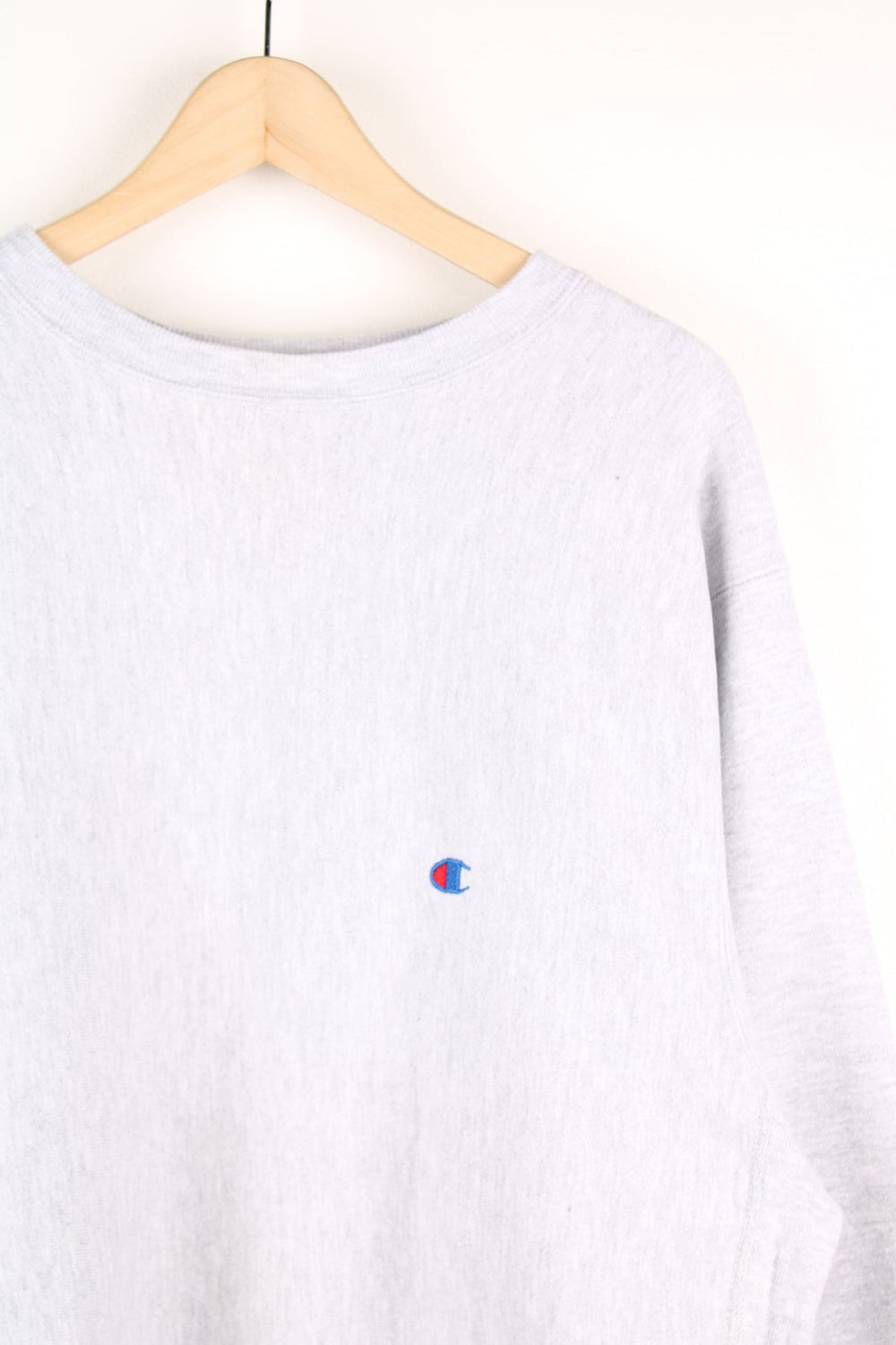 Grey Champion reverse weave sweatshirt with embroidered logo on the chest.