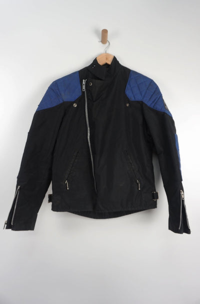 Vintage Made In England Belstaff black biker jacket in good condition.