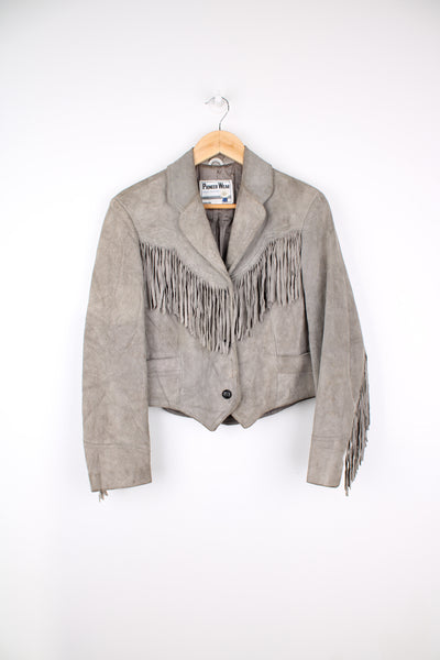 Vintage 1980's grey suede fringe jacket by Pioneer Wear, features a cropped fit with fringe detail down the front/ back and sleeves