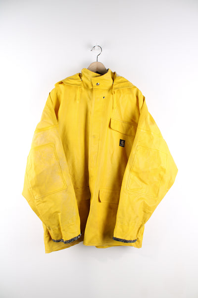 Carhartt yellow button up rain/surrey coat, features raised logo on the chest and hood