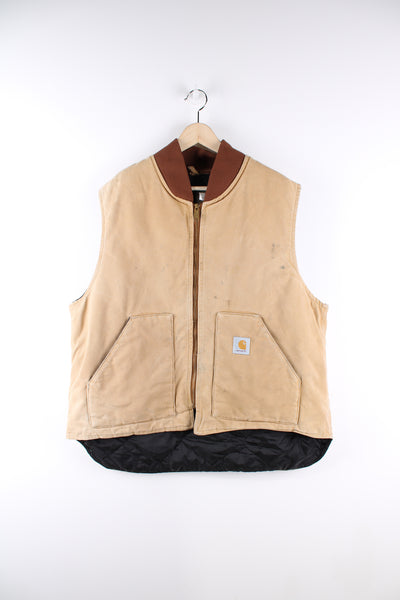 Carhartt tan union made in the USA heavy duty cotton workwear gilet, features quilted lining and signature logo on the pocket