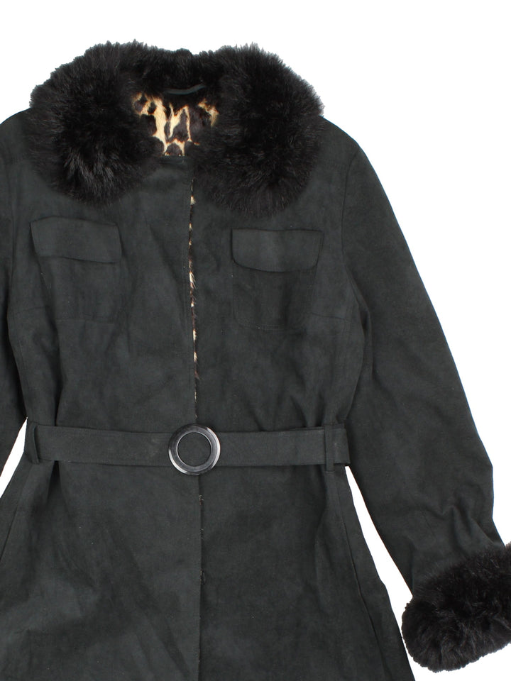 Vintage Leopard Print Lined Afghan Coat in a black colourway. Popper button fastening with breast pocket, full leapard print lining and faux fur collar and cuffs.