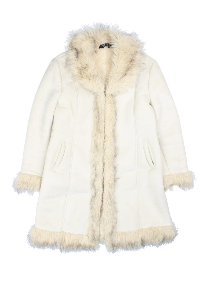 Vintage Y2K Afghan Coat in a white colourway. Zip and hook an eye fastenings side pockets and faux fur lining.