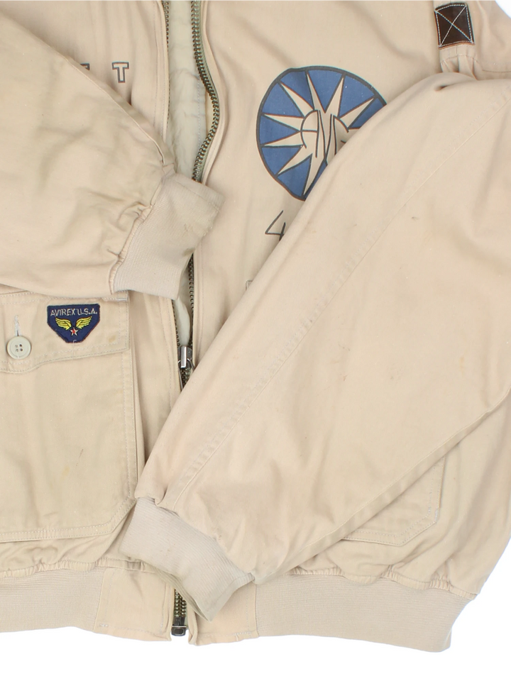 Vintage Avirex type G-1 tan cotton flight jacket with all over printed details and embroidered badge on the pocket