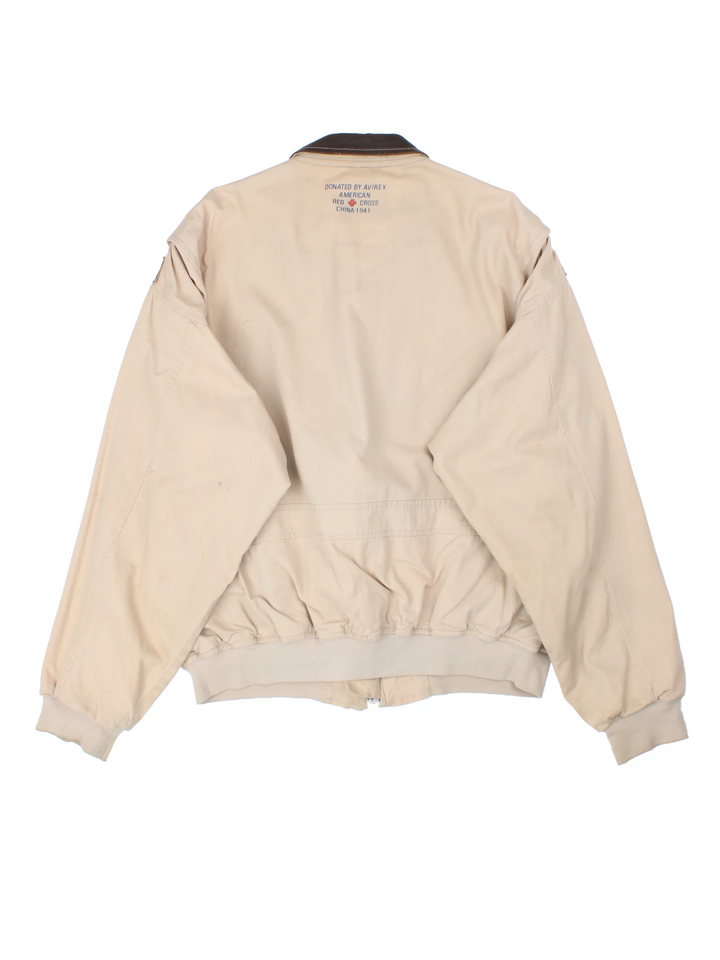 Vintage Avirex type G-1 tan cotton flight jacket with all over printed details and embroidered badge on the pocket