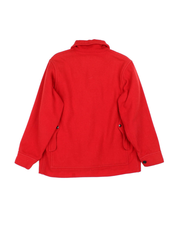 Vintage 70's Filson Mackinaw Cruiser Jacket in a red colourway, buttons up and has multiple pockets, including a big pouch pocket on the back.