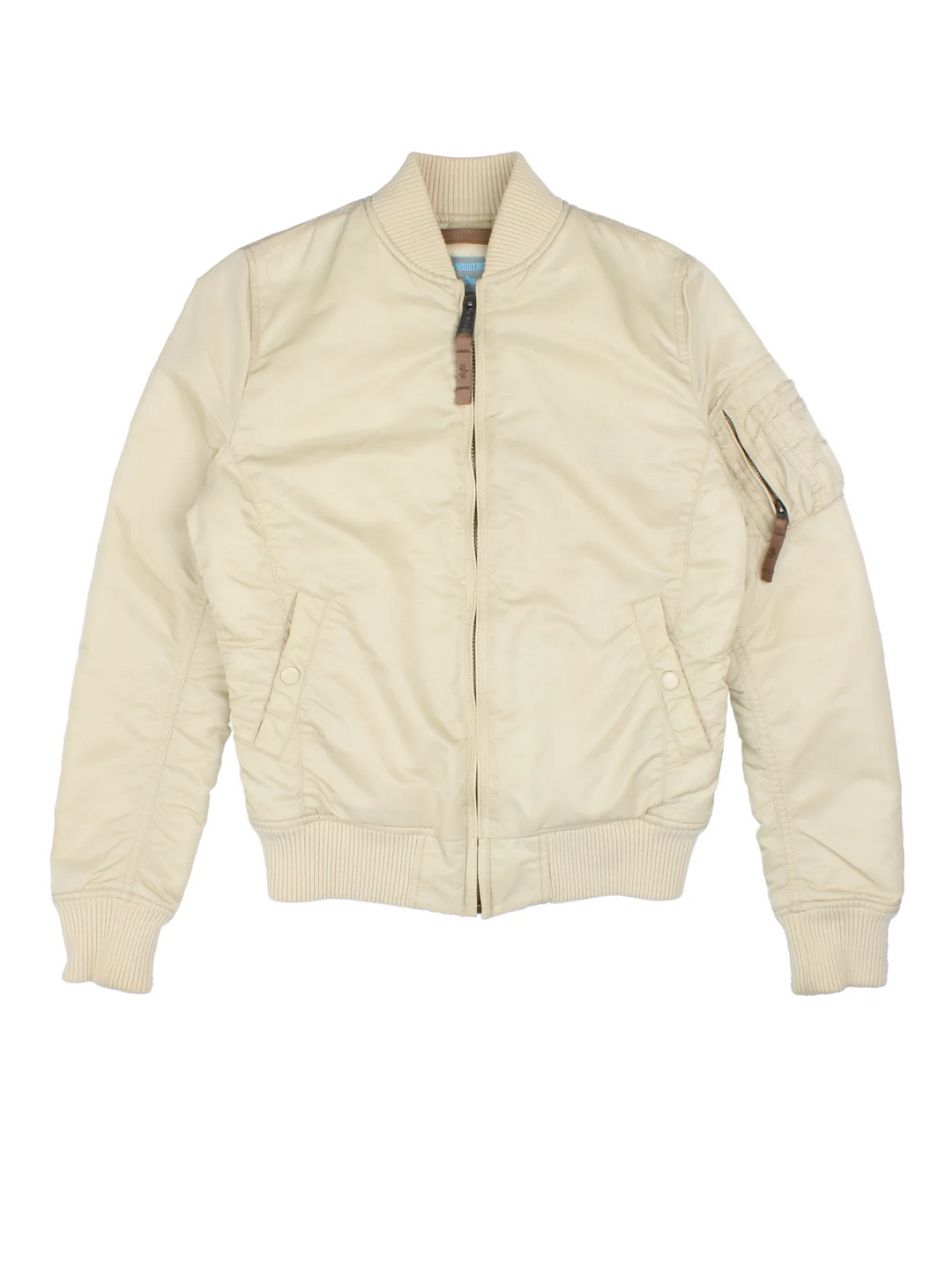 Alpha Industries Bomber Jacket in a tan colourway. Zips up and has multiple pockets, insulated lining, and has the logo tab embroidered on the left sleeve pocket.