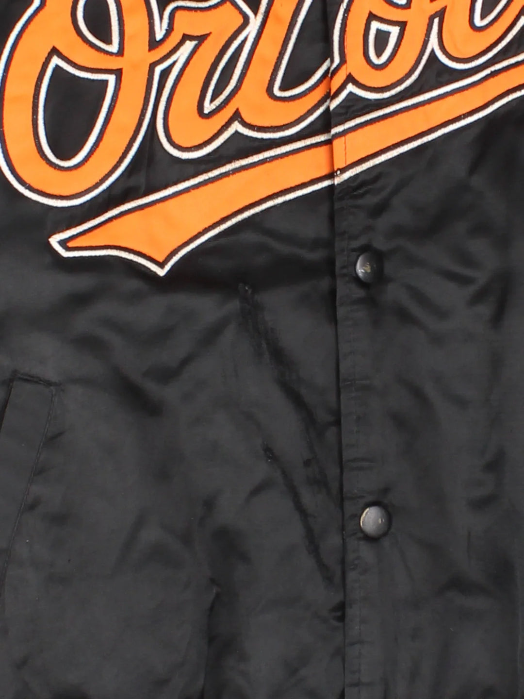 90's Baltimore Orioles MLB Varsity Jacket in a black and orange colourway. Buttons up and has side pockets, insulated lining, and has the team spell out logo embroidered across the front.