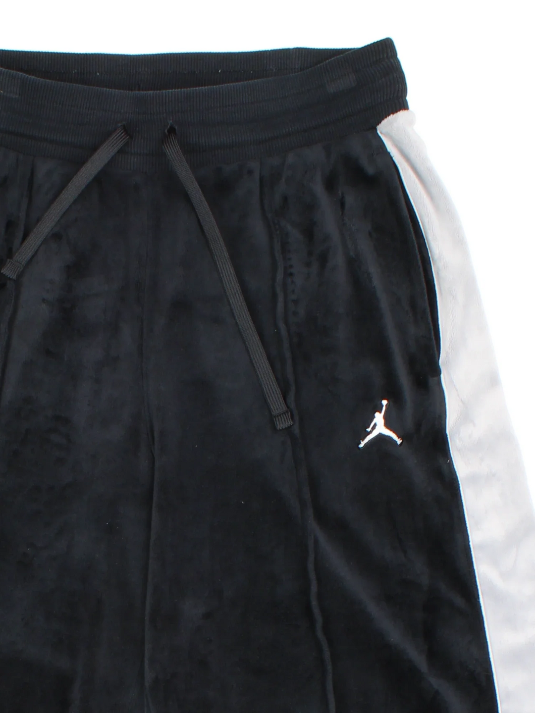 Y2K Air Jordan Velour Tracksuit Bottoms in a black and grey colourway with front pockets, wide leg, adjustable waist with drawstring, and the logo embroidered on the front.
