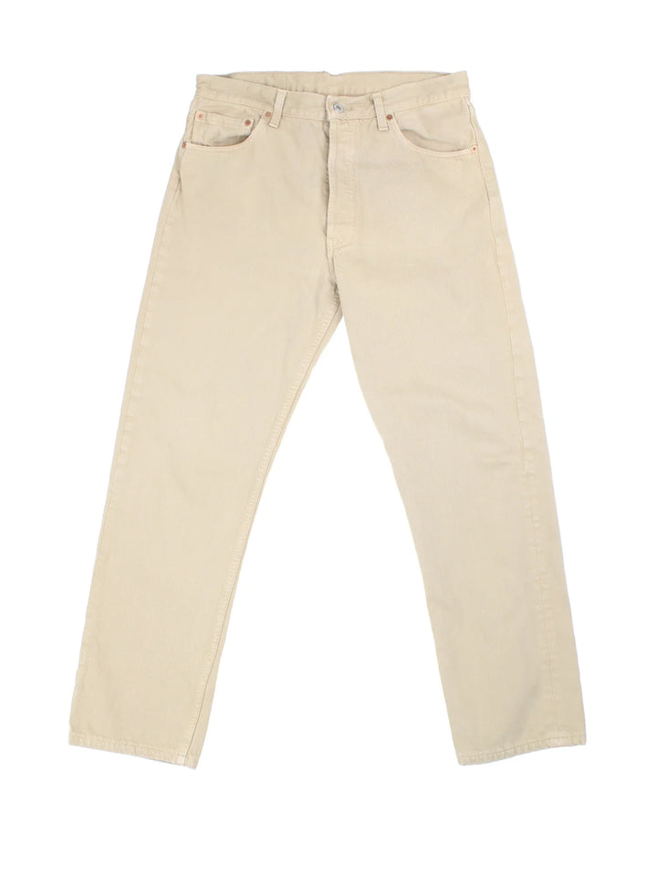 Levi Strauss 501 Jeans in tan colourway with multiple pockets and the logo embroidered on the back.