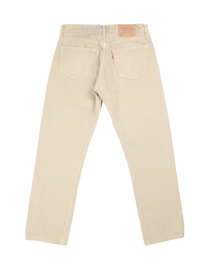 Levi Strauss 501 Jeans in tan colourway with multiple pockets and the logo embroidered on the back.