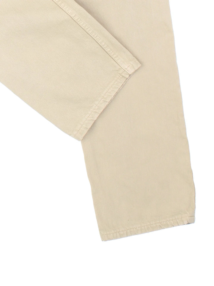 Levi Strauss 501 Jeans in tan colourway with multiple pockets and the logo embroidered on the back.